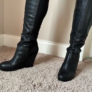 Malori Wedge Heeled Boots with pull on stretch uppers and leather sole